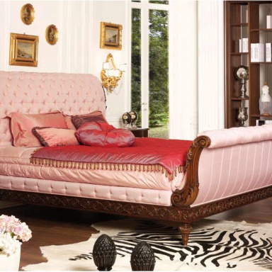 Bed with upholstered headboard