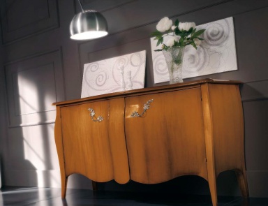 A chest of drawers on high legs, Sangiorigo