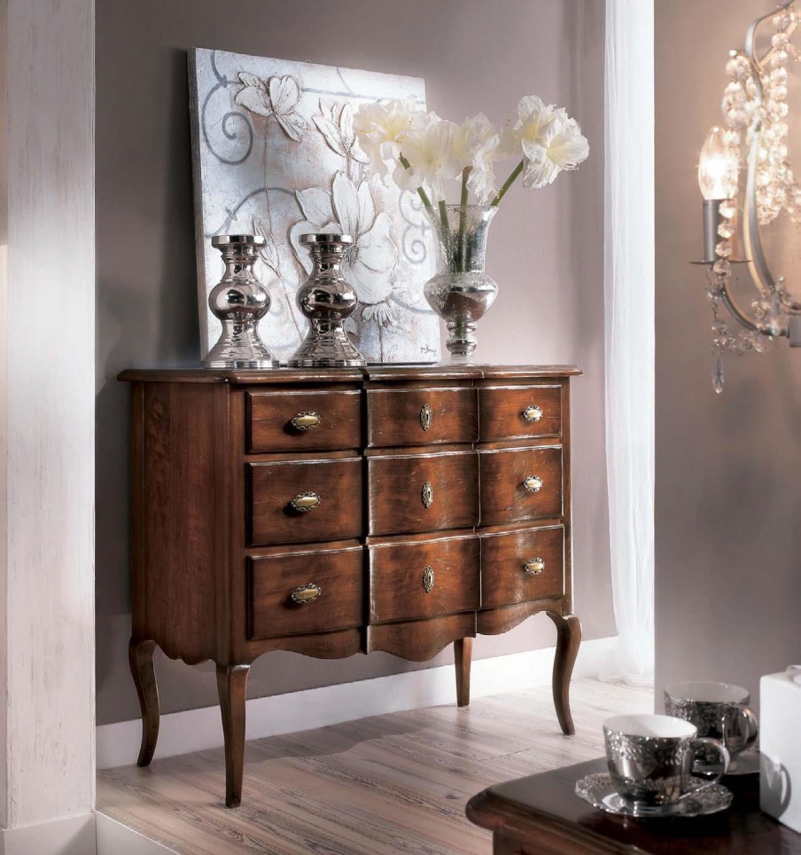 A chest of drawers on high legs, Sangiorigo