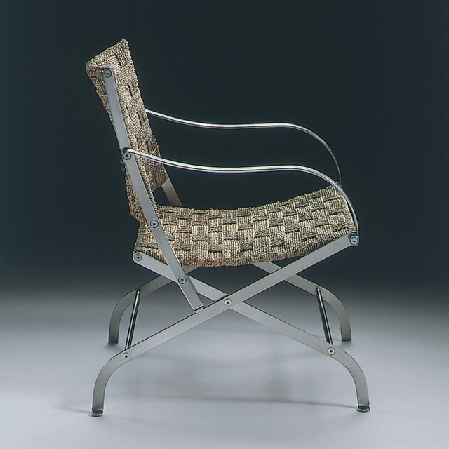 A chair on a frame of chrome-plated metal Carlotta Flexform