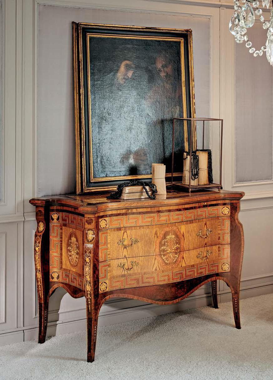 A chest of drawers on high legs, Annibale Colombo