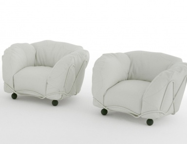 The soft armchair with armrests poltrona Corbeille, Edra