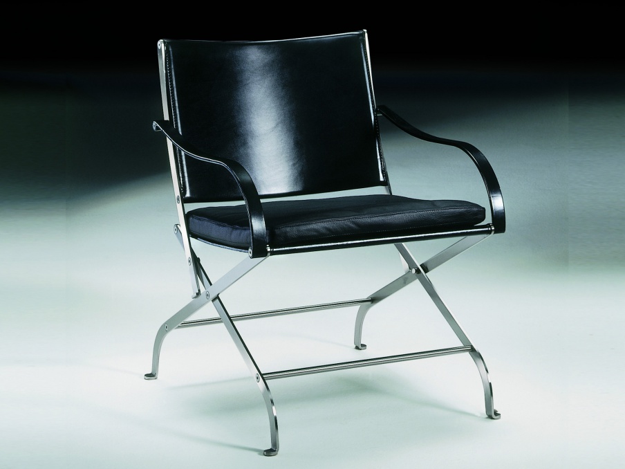 A chair with arms on a metal frame Carlotta Flexform