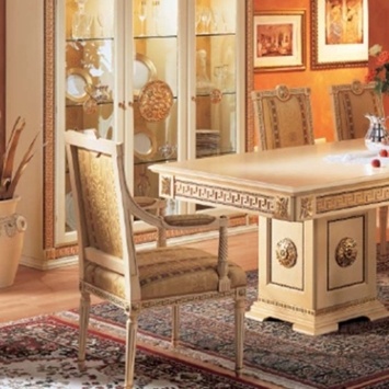 The chair with the frame made of solid wood upholstered in fabric Miami, Caspani Tino