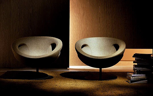 The chair on a rotating basis from metal in a glossy finish , - Swan