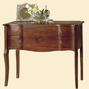 a chest of drawers on high legs