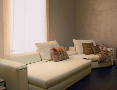 Ribot sectional sofa in leather upholstery, Fendi