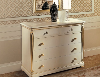 A chest of drawers with gold detail Copland, Angelo Cappellini