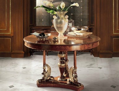 Coffee table with carved base by Angelo Cappellini