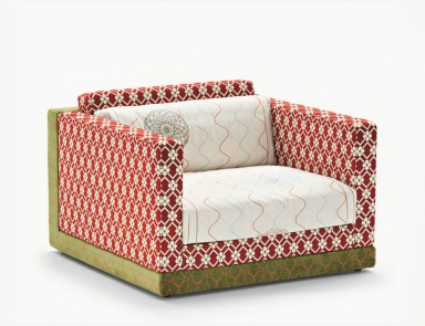 The Karmakoma armchair with a frame made of wood, Moroso