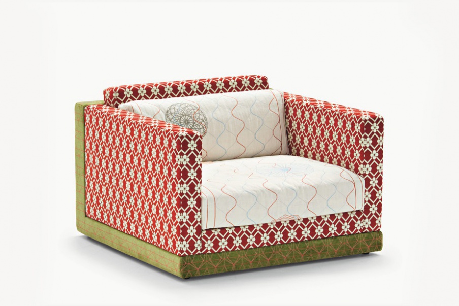 The Karmakoma armchair with a frame made of wood, Moroso