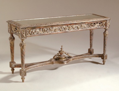 The console is made of brass, La Barge