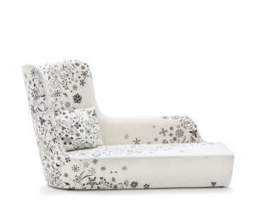 The couch is Closer in fabric, Moroso