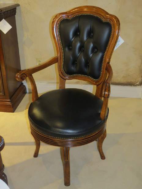 Chair in leather upholstery, Francesco Molon