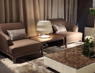 A chair with one armrest Oscar, Rugiano