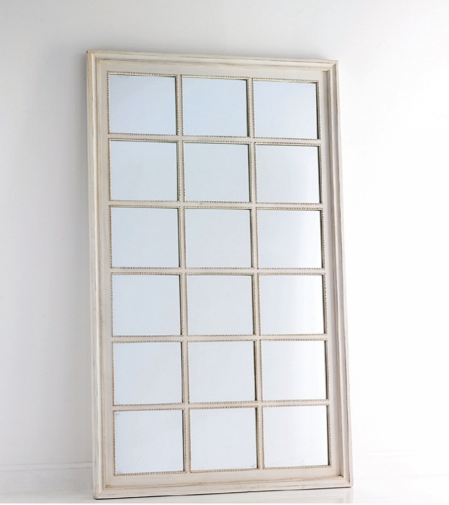 The rectangular mirror in a wooden frame, Chelini