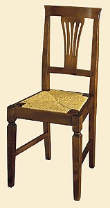 The chair has a carved DOLFI