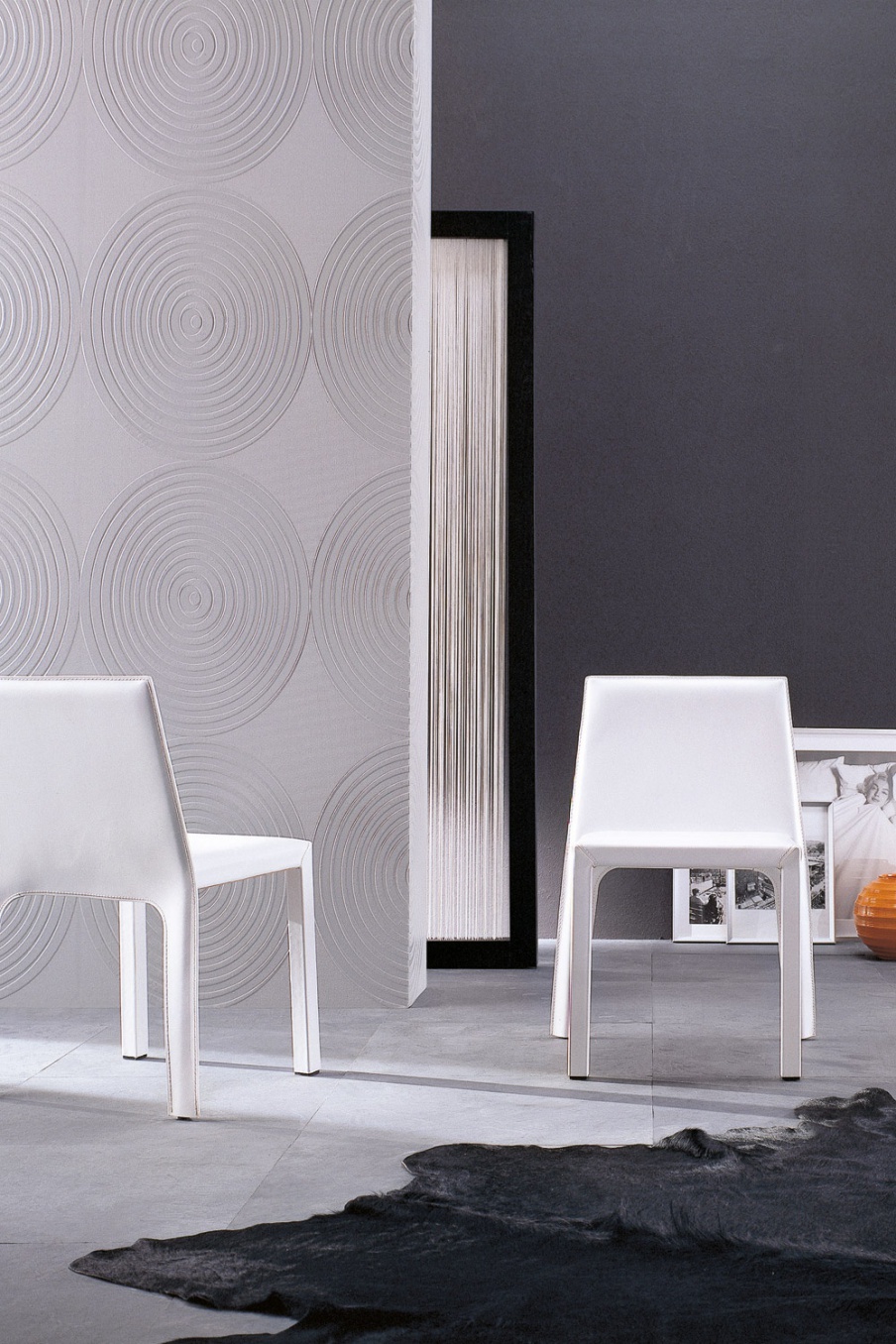 Chair on a metal frame, fully leathern, Area - Porada