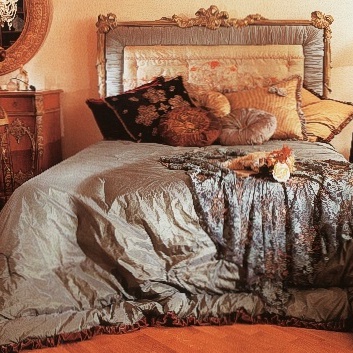 Double bed with upholstered headboard