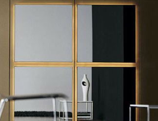 A mirror in a frame of polished aluminum, Domino - Presotto