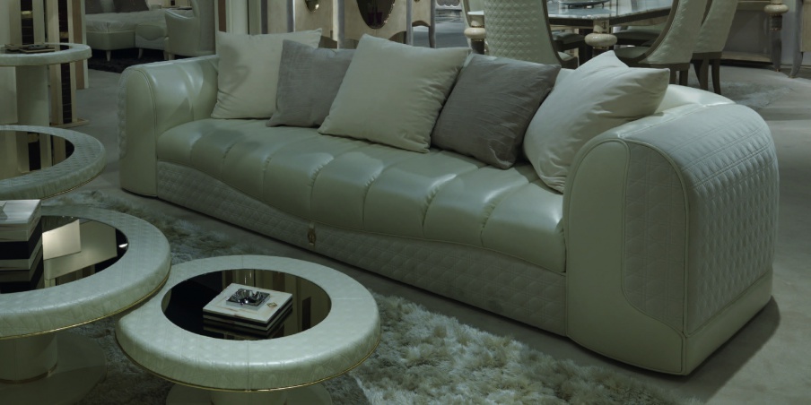 Three-seater sofa in leather upholstery Caractere, Turri 