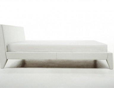 Double bed with a podium covered with skin on the leg, Nabucco - Rivolta