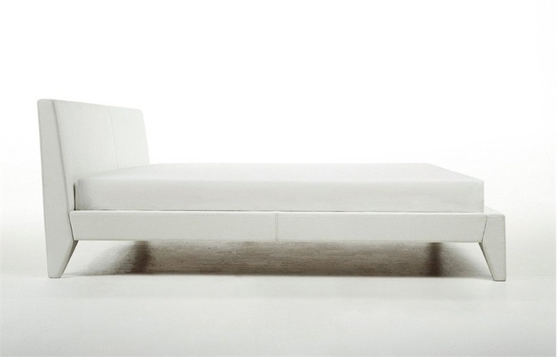 Double bed with a podium covered with skin on the leg, Nabucco - Rivolta