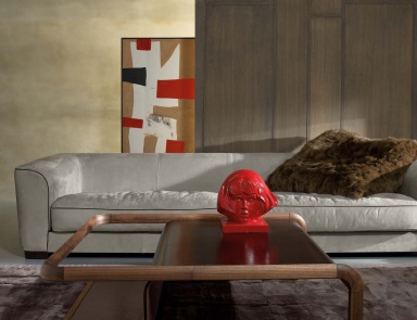 Coffee table with curved table top of Doom ate Luxury, Ulivi