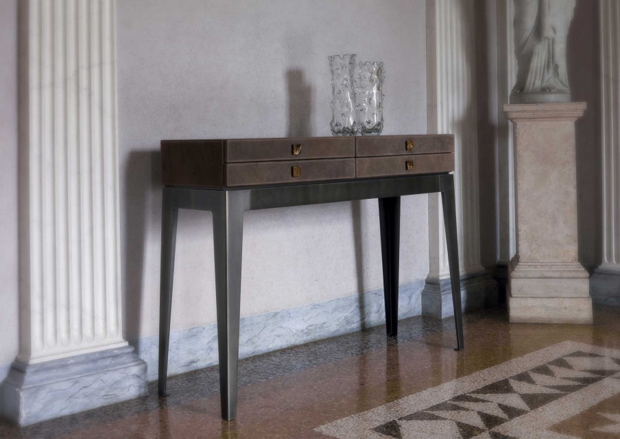 A chest of drawers with a metal frame Lady, Longhi