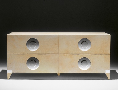 A chest of drawers made from natural wood, Tura