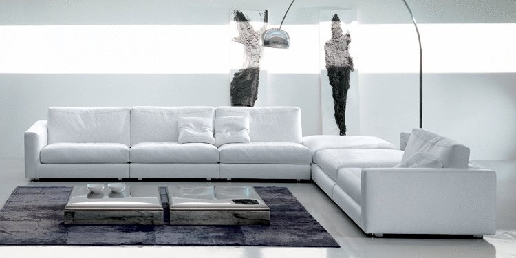 A sofa on legs of polished steel, One - Rivolta