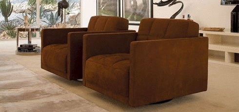 An easy chair on a round metal base, Palas - Rivolta