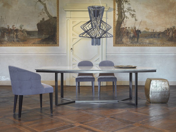 The chair is upholstered in Charlotte, Giulio Marelli