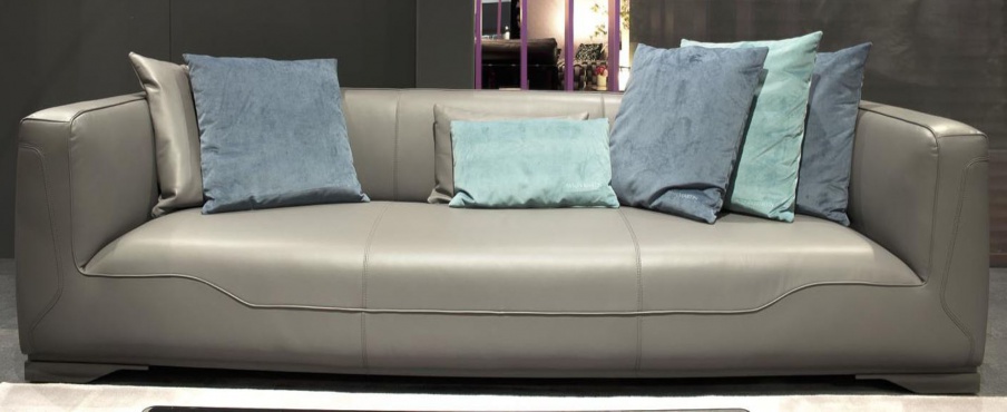 The sofa in upholstered in a smooth gray leather V133, Formitalia