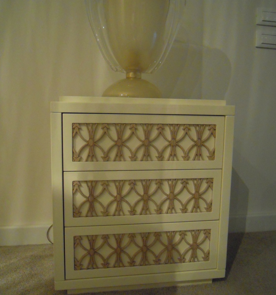 Bedside table in ivory bedside with three drawers with carved oak