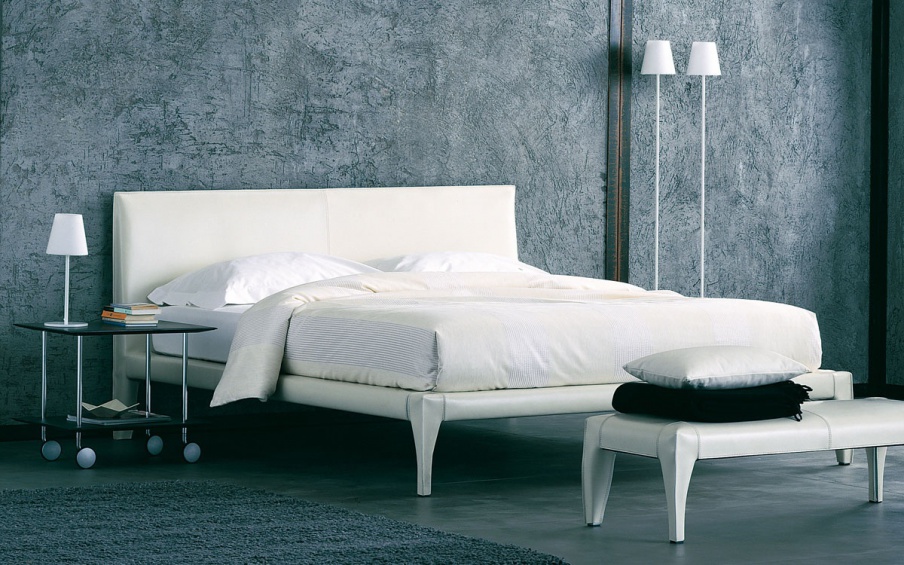 The bed on a metal frame with leather covering Alicudi, Flou