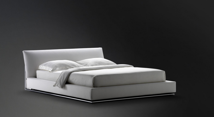 The bed on a metal frame upholstered in leather or fabric Sailor, Flou