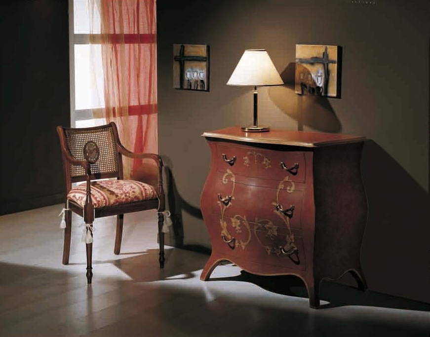 The chest in maroon shade with inlaid Augusto, Arve Style