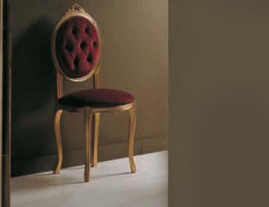 The chair in upholstered in textile with buttons-Capito Ovalina, Arve Style