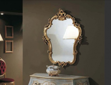 A mirror with a through thread in the gold finish 700, Arve Style