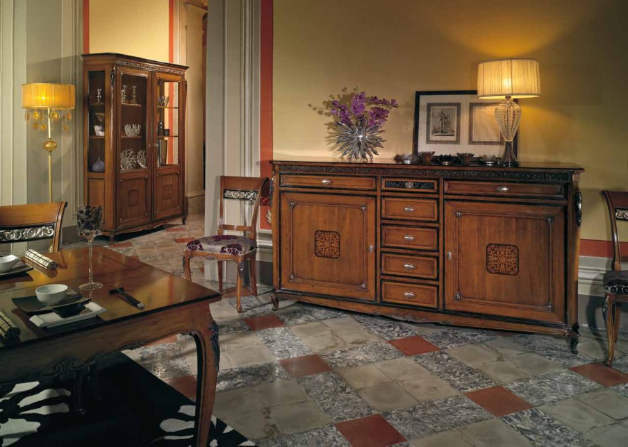 The sideboard on carved legs with 4 drawers in the center Villa, Arve Style