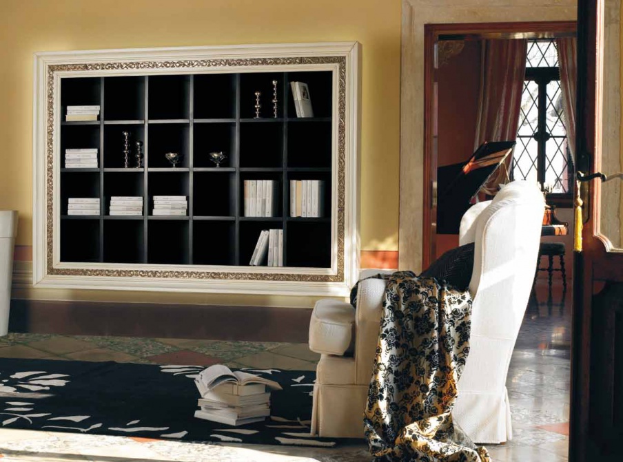 The rack is in a white carved frame Villa, Arve Style.