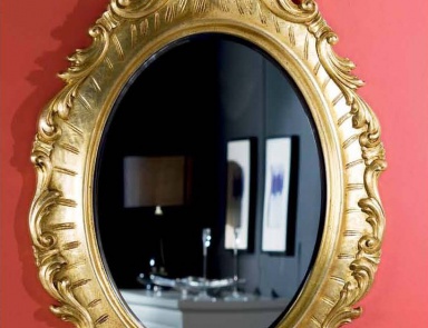Mirror in oval carved frame, Mirandola export
