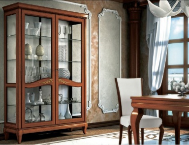 Showcase budhwara in walnut veneer with ornamentation in gold Mir?, Arve Style