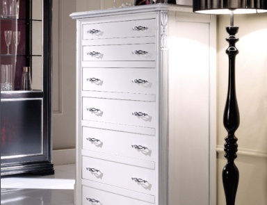 A chest of drawers with decorative handles, Mirandola Export