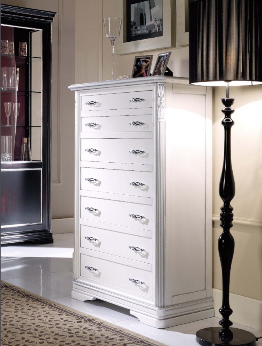 A chest of drawers with decorative handles, Mirandola Export