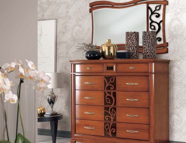 A chest of drawers with carved pattern on the facade, Mirandola Export