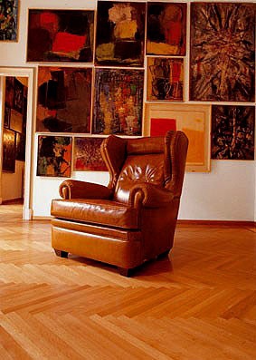 The high-backed chair upholstered in leather Oxford, Mascheroni