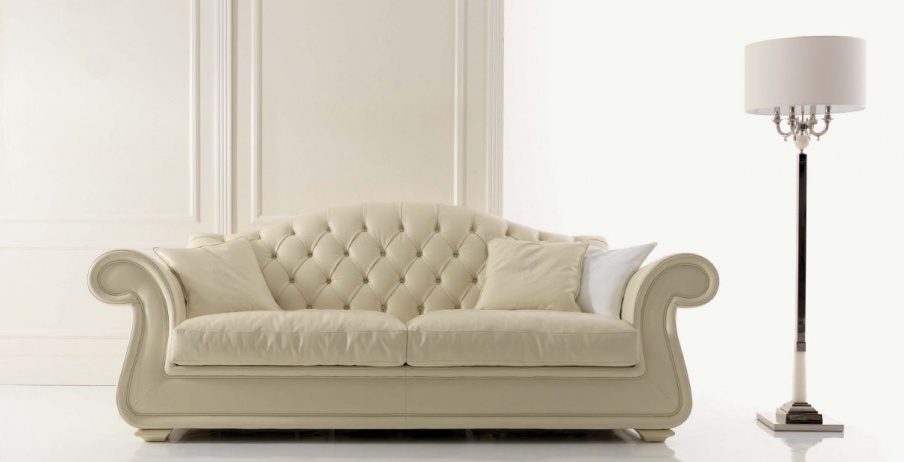 The four-seater sofa with decorative stitch-Capito Brema, Tosconova