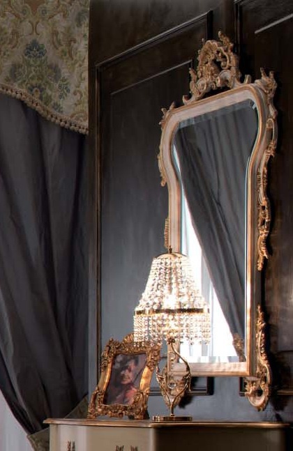 A mirror in a frame with smooth curves SP90, Tosconova